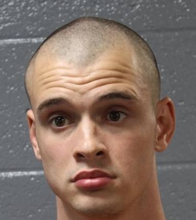 Mugshot of Adam Mikell