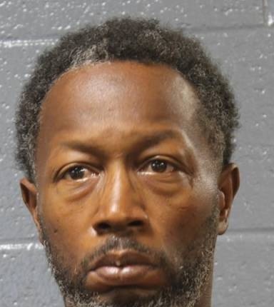 Mugshot of Bruce Evans