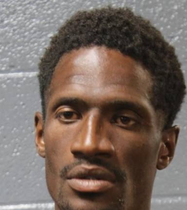 Mugshot of Carlos Adenigregon