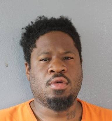 Mugshot of Delvin Okoe