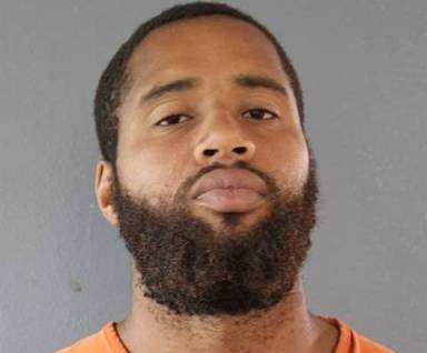 Mugshot of Elmer Milton