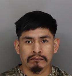 Miguel Pu mugshot