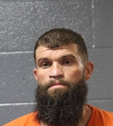 Mugshot of Justin Hook