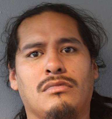 Mugshot of Justin Yeahquo