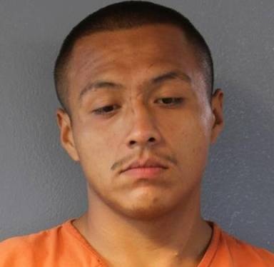 Mugshot of Mathew Domebo