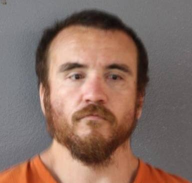 Mugshot of Michael East