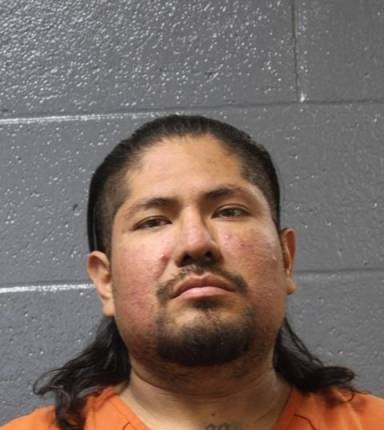 Mugshot of Oscar Mezomo