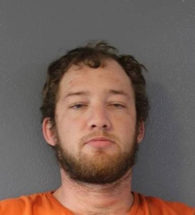 Mugshot of Sidney Adams