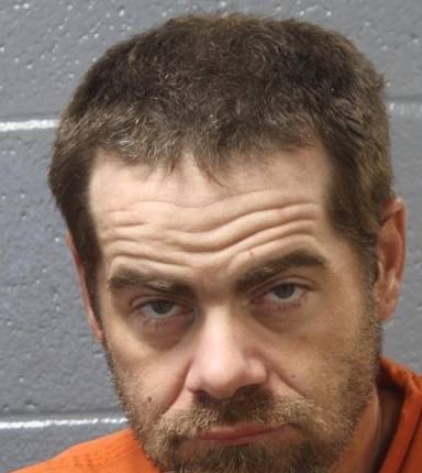 Mugshot of Travis Standard
