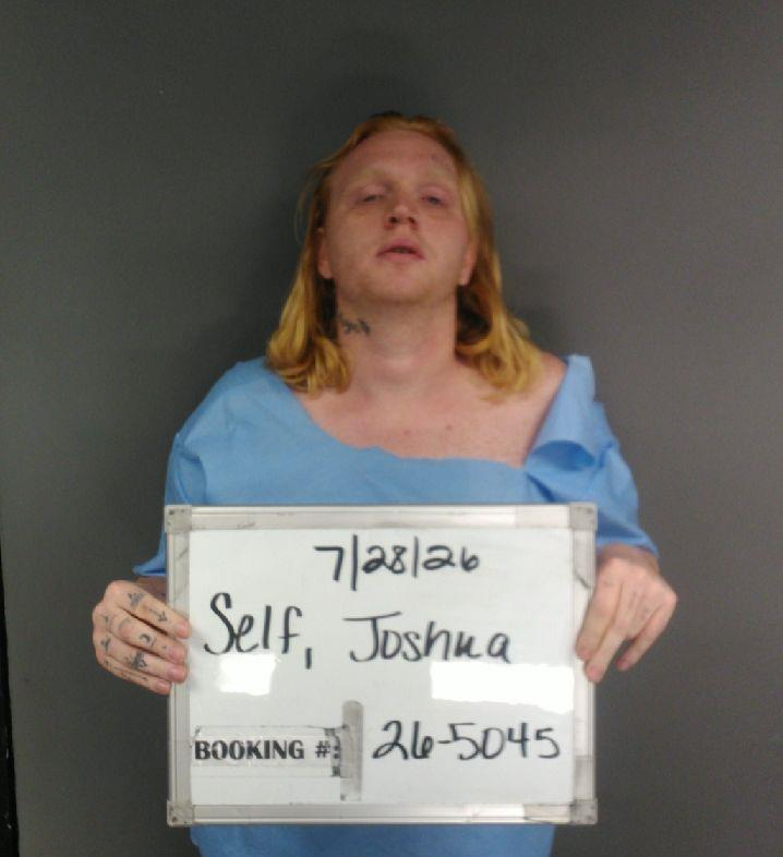 Joshua Caine Self mugshot